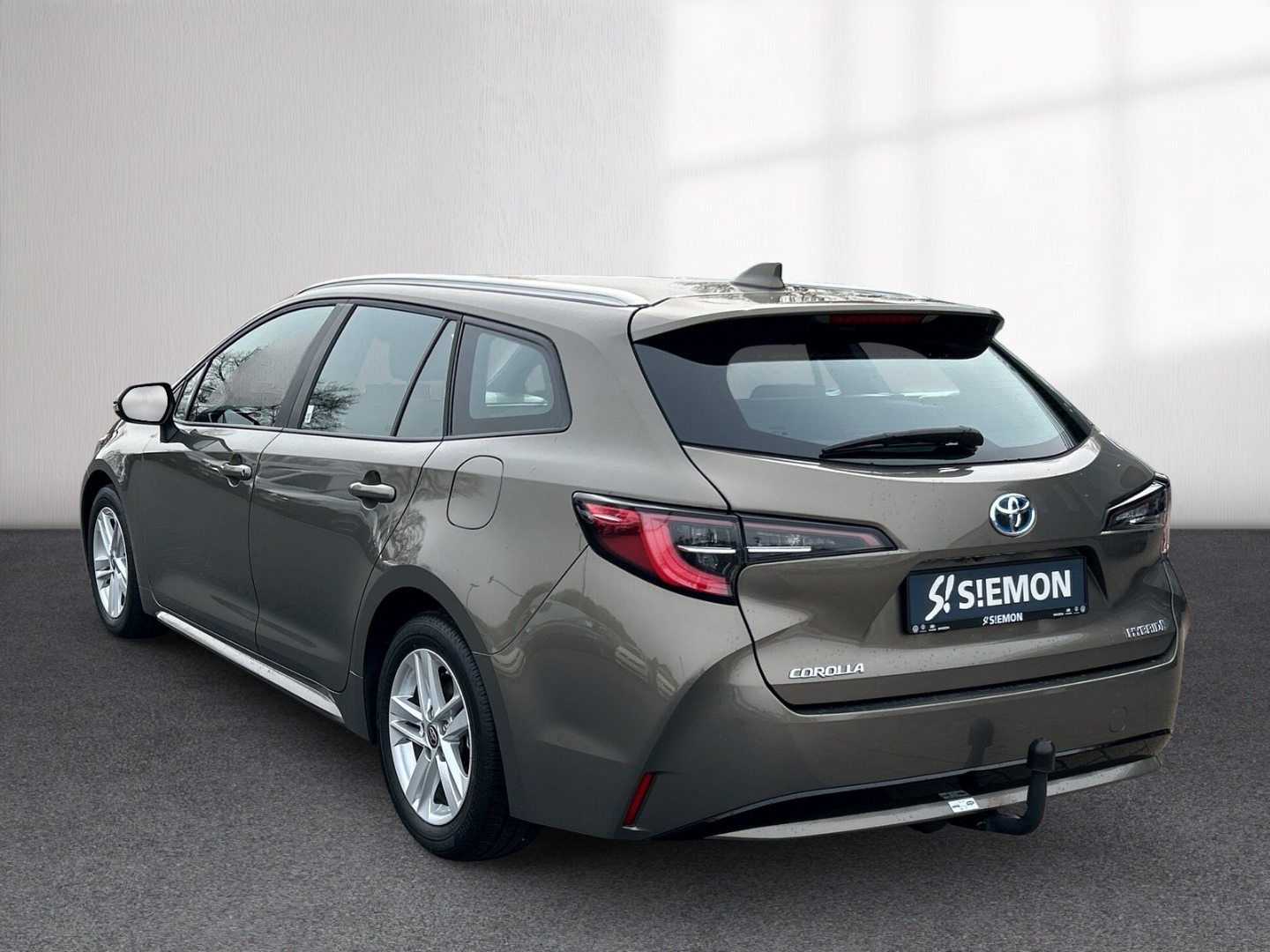 Fahrzeugabbildung Toyota Corolla TS Hybrid Business AHK NAV TEMP SHZ LED