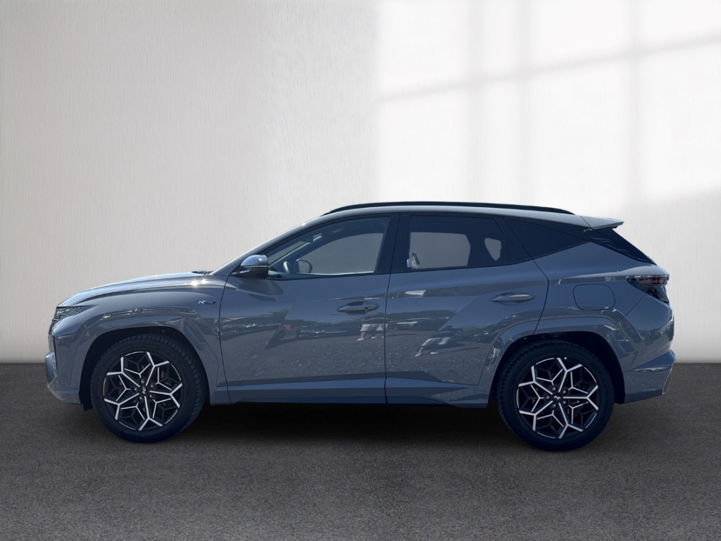 Fahrzeugabbildung Hyundai TUCSON 1.6 T-GDi DCT 4WD 48V N-Line Assist-P Sitz-P ECS AHK Allwetter Navi Digitales Cockpit